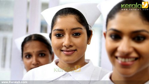 maram peyyumbol malayalam movie anumol stills 66-006