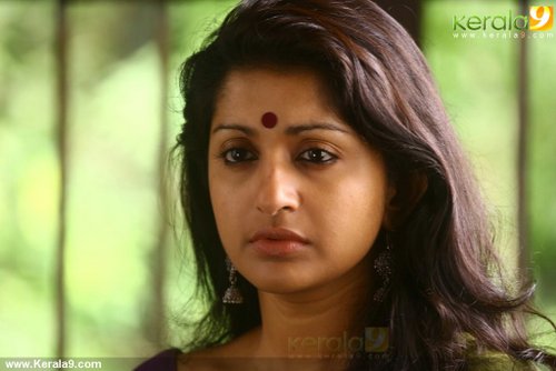 mazhaneerthullikal malayalam movie meera jasmine photos 47-002