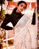 anupama-parameswaran-in-white-saree-with-black-full-sleeve-blouse