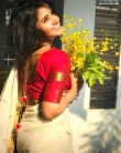 anupama parameswaran kerala saree latest photos-005