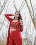 anusree-photoshoot-in-burgundy-red-shade-dress.webp