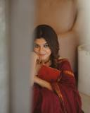 aparna-balamurali-in-coffee-brown-pattu-saree-with-chiku-colour-blouse-photos-002