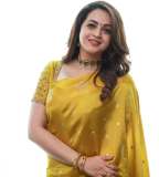 bhavana-in-mango-yellow-saree-photos-002