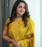 bhavana-in-mango-yellow-saree-photos-006