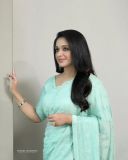 kavya-madhavan-in-green-shades-colour-saree-photos-001