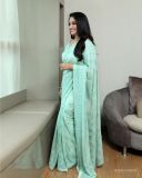 kavya-madhavan-in-green-shades-colour-saree-photos-002