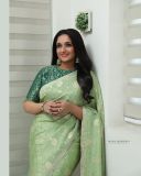 kavya-madhavan-in-green-shades-colour-saree-photos-003