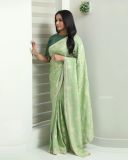 kavya-madhavan-in-green-shades-colour-saree-photos-004