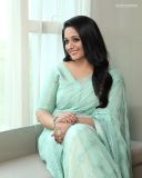 kavya-madhavan-in-green-shades-colour-saree-photos