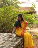 kayadu-lohar-in-yellow-saree-with-green-blouse-photos-005