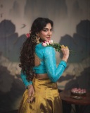 madonna-sebastian-in-blue-blouse-and-golden-skirt-photos-001