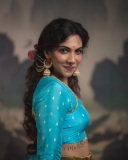 madonna-sebastian-in-blue-blouse-and-golden-skirt-photos-011