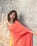 madonna-sebastian-in-orange-colour-saree-photos-003