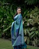 malavika-menon-in-peacock-color-saree-photos-004