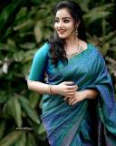 malavika-menon-in-peacock-color-saree-photos-006