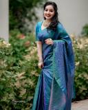 malavika-menon-in-peacock-color-saree-photos