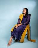manjima-mohan-in-violet-and-mango-red-combination-dress-photos-001