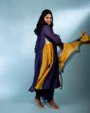 manjima-mohan-in-violet-and-mango-red-combination-dress-photos-002