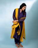 manjima-mohan-in-violet-and-mango-red-combination-dress-photos-003