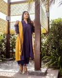 manjima-mohan-in-violet-and-mango-red-combination-dress-photos
