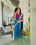 mareena-michael-kurisingal-in-sky-blue-pattu-saree-with-heavy-design-blouse-photos