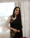 namitha-pramod-in-black-saree-with-sleeveless-heavy-work-blouse-photos-007