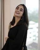 namitha-pramod-in-black-saree-with-sleeveless-heavy-work-blouse-photos-009