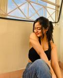 nandana-varma-in-black-crop-top-and-jeans-style-photos-003