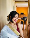 nandana-varma-in-red-blouse-and-set-saree-combo-for-vishu-001