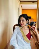 nandana-varma-in-red-blouse-and-set-saree-combo-for-vishu-002