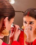 nayanthara-in-red-pattu-saree-with-heavy-ornaments-and-makeup-look-photos-006