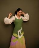 nikhila-vimal-in-flower-printed-olive-green-and-white-dress-photos-001