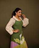 nikhila-vimal-in-flower-printed-olive-green-and-white-dress-photos