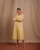 nikhila-vimal-in-light-lemon-yellow-colour-premium-kurti-dress-photos-003