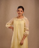 nikhila-vimal-in-light-lemon-yellow-colour-premium-kurti-dress-photos-004