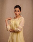 nikhila-vimal-in-light-lemon-yellow-colour-premium-kurti-dress-photos