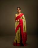 nikhila-vimal-in-olive-green-in-red-border-saree-images-002