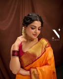 nikhila-vimal-in-orange-orange-pattu-saree-with-maroon-red-blouse-photos