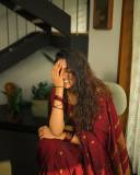 nimisha-sajayan-in-kumkum-red-pattu-saree-photos-005