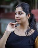 niranjana-anoop-in-heavy-border-black-pattupavada-and-blouse-photos-001