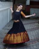 niranjana-anoop-in-heavy-border-black-pattupavada-and-blouse-photos