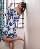 niranjana-anoop-in-off-shoulder-floral-print-short-dress-photos-001