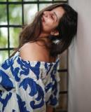 niranjana-anoop-in-off-shoulder-floral-print-short-dress-photos-002