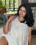 poonam-bajwa-in-white-short-top-photos-003