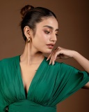 priya-varrier-in-green-short-gown-with-wide-neck-style-photos.varrier_450437441_1634440747400210_5261010582505442066_n