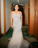 rajisha-vijayan-in-off-shoulder-silver-gown-with-heavy-makeup-look-photos