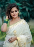 remya nambeesan new onam saree photos