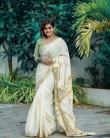 remya nambeesan new onam saree photos -002