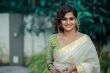 remya nambeesan new onam saree photos -003