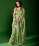 saniya-iyappan-in-green-chiffon-saree-with-sleeveless-blouse-design-photos-002